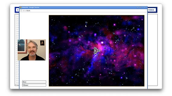 A man observes a computer screen showcasing a stunning galaxy image, captivated by the celestial beauty.